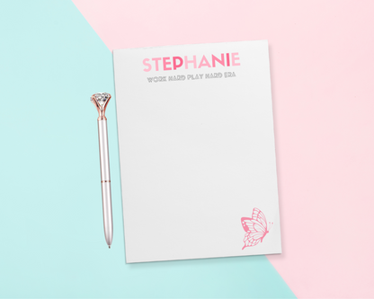 We all know that person who loves Pop culture! Give a thoughtful and useful gift for someone to stay organized. Personalized notepads are exactly the gift they’d love. Choose the color combination for the recipient's name and custom slogan below - such as "Work Hard Play Hard Era".