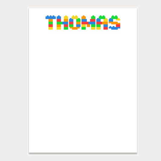 Give a thoughtful and useful gift for a little kid who loves Lego and also loves drawing or writing. Customize their names with Lego-like text! Personalized notepads are exactly the gift they’d love.